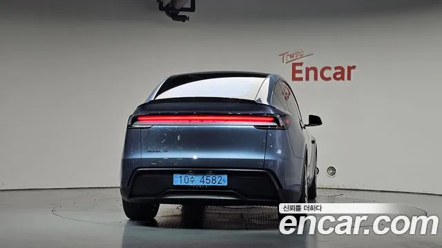 Tesla Model Y — Фото автомобиля 4
