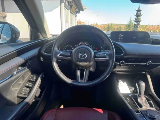 Mazda Axela — Фото автомобиля 16