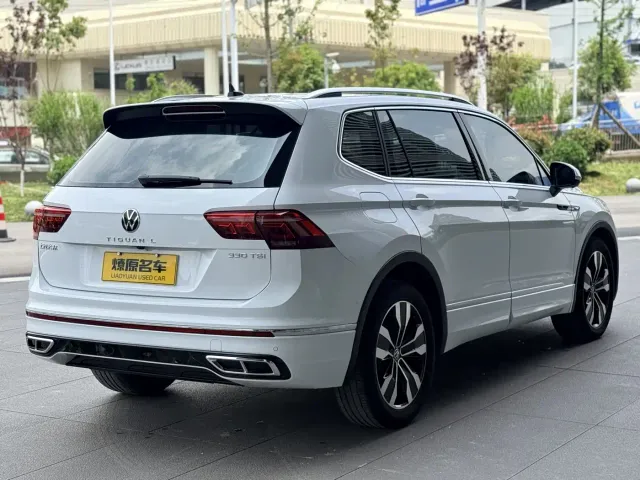 Volkswagen Tiguan L — Фото автомобиля 7