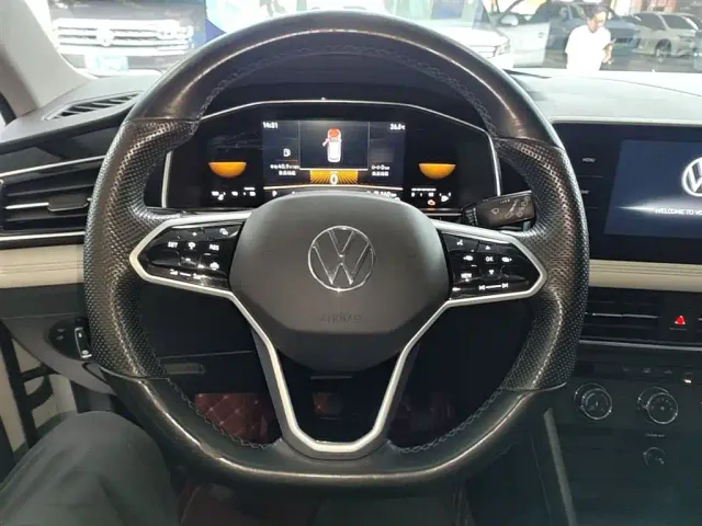 Volkswagen Tiguan L — Фото автомобиля 10