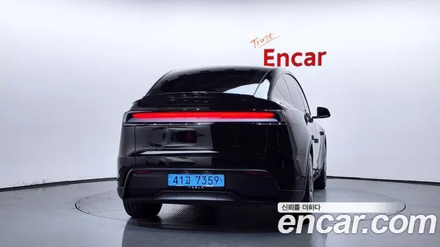 Tesla Model Y — Фото автомобиля 4