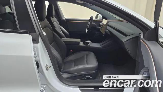 Tesla Model 3 — Фото автомобиля 16