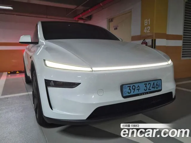 Tesla Model Y — Фото автомобиля 2
