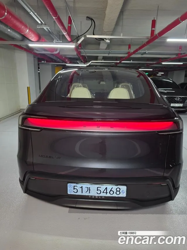 Tesla Model Y — Фото автомобиля 4