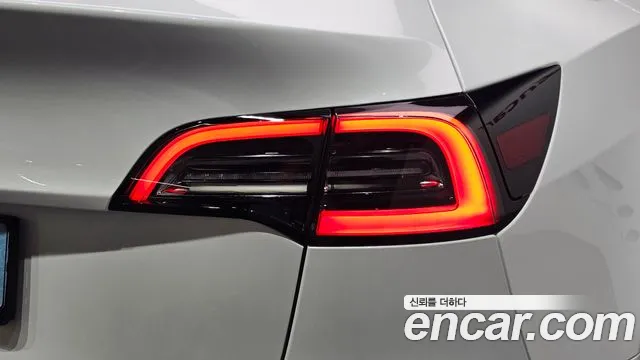 Tesla Model Y — Фото автомобиля 7