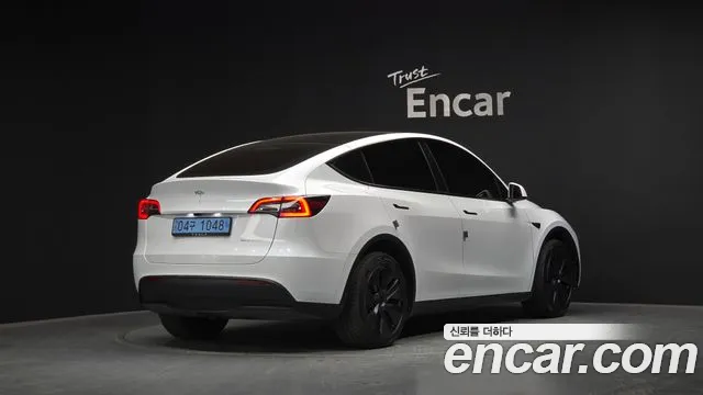 Tesla Model Y — Фото автомобиля 2