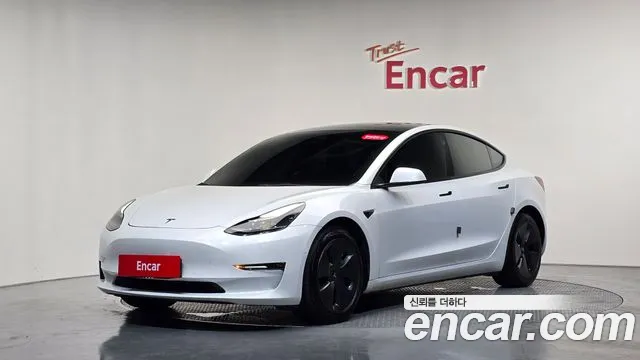 Tesla Model 3 — Фото автомобиля 9
