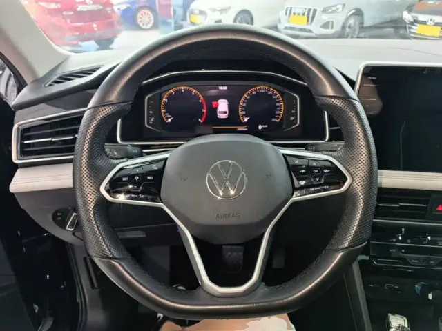 Volkswagen Tiguan L — Фото автомобиля 10