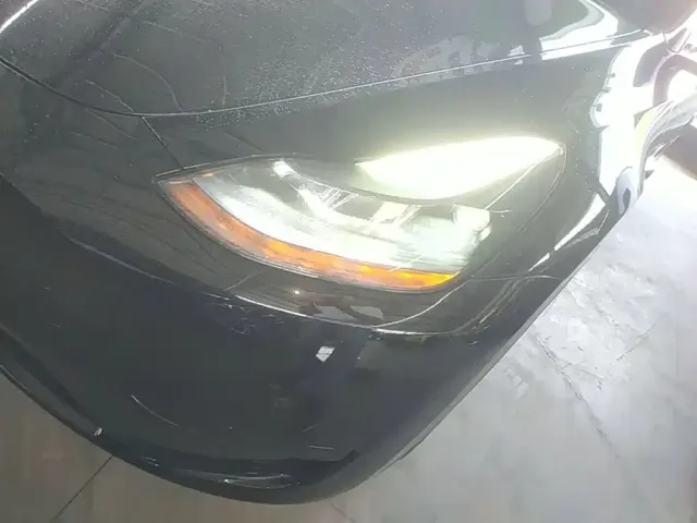 Tesla Model Y — Фото автомобиля 23