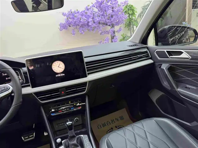 Volkswagen Tiguan L — Фото автомобиля 16