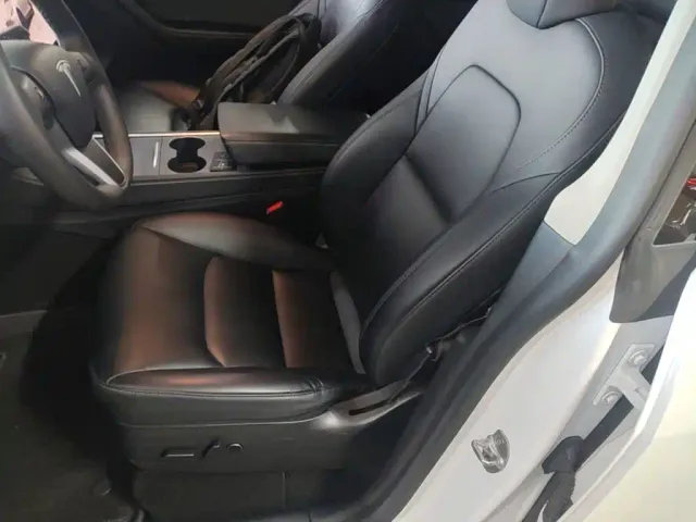 Tesla Model Y — Фото автомобиля 14