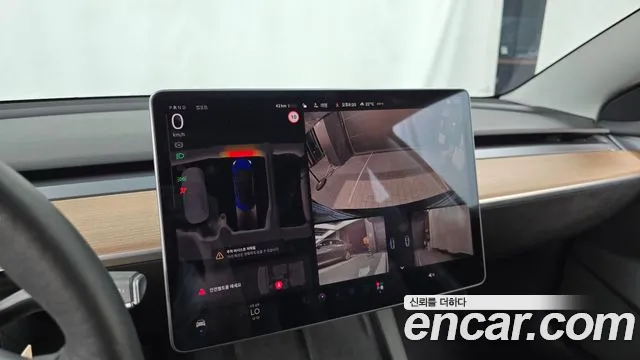 Tesla Model 3 — Фото автомобиля 23