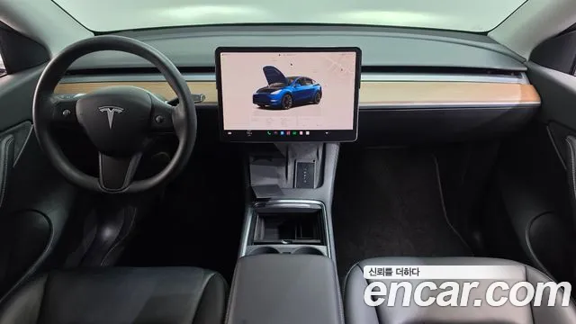 Tesla Model Y — Фото автомобиля 10