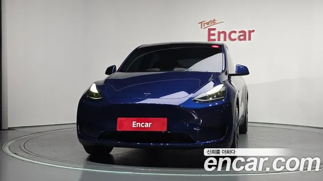 Tesla Model Y — Фото автомобиля 3