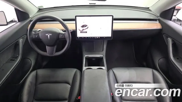 Tesla Model Y — Фото автомобиля 6