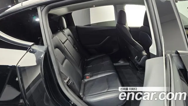 Tesla Model Y — Фото автомобиля 17