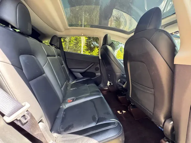 Tesla Model Y — Фото автомобиля 13