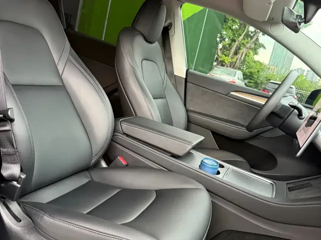 Tesla Model Y — Фото автомобиля 14