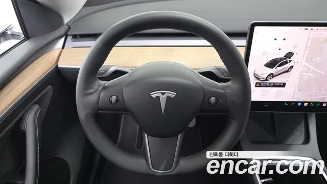 Tesla Model Y — Фото автомобиля 14