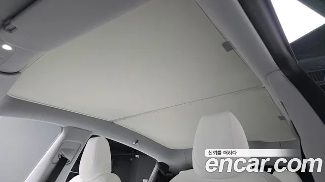 Tesla Model Y — Фото автомобиля 22