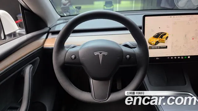 Tesla Model Y — Фото автомобиля 13
