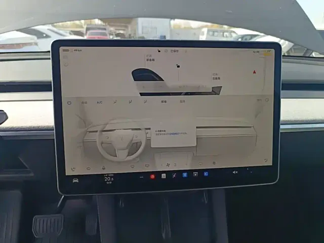 Tesla Model Y — Фото автомобиля 12
