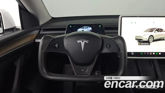 Tesla Model Y — Фото автомобиля 12
