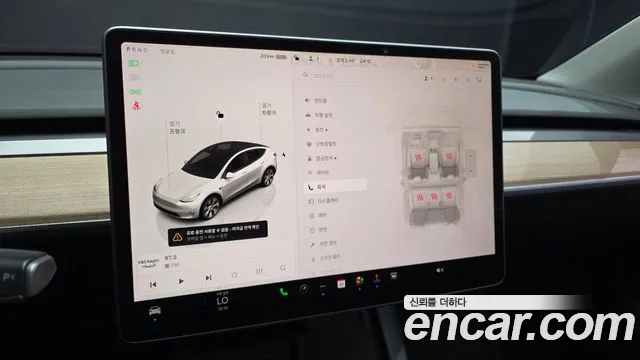 Tesla Model Y — Фото автомобиля 18