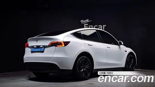 Tesla Model Y — Фото автомобиля 2