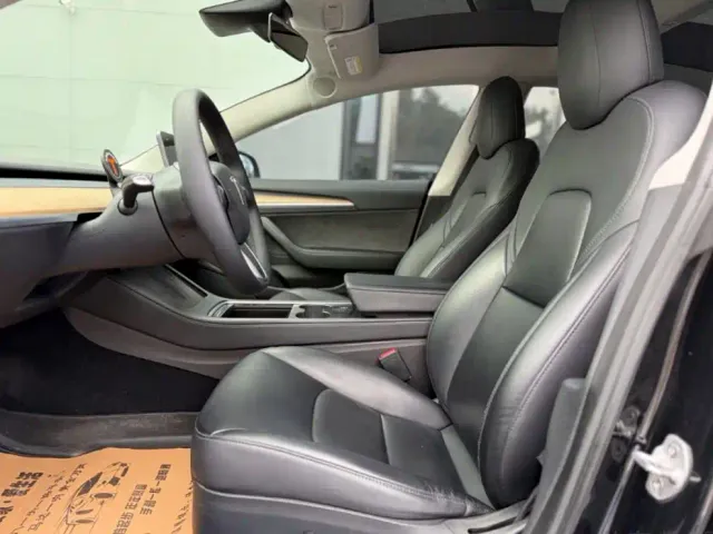 Tesla Model 3 — Фото автомобиля 6
