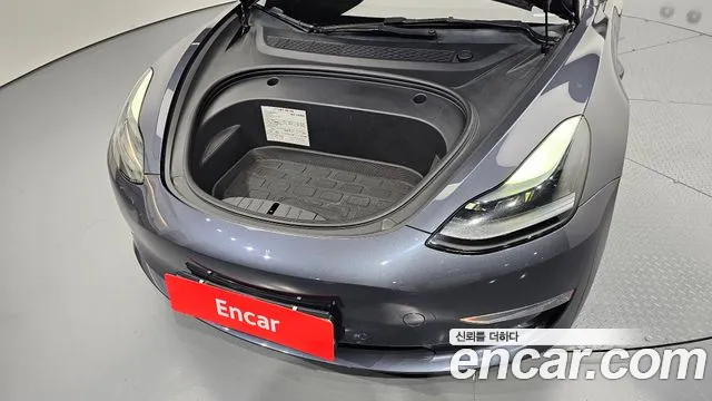 Tesla Model 3 — Фото автомобиля 9