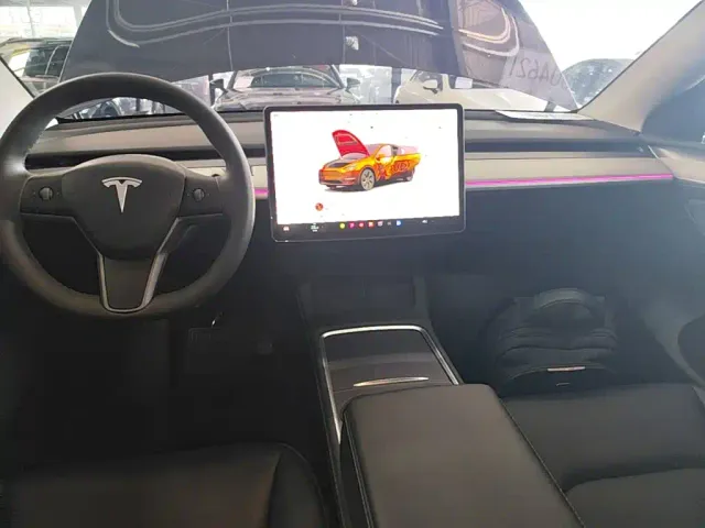 Tesla Model Y — Фото автомобиля 12