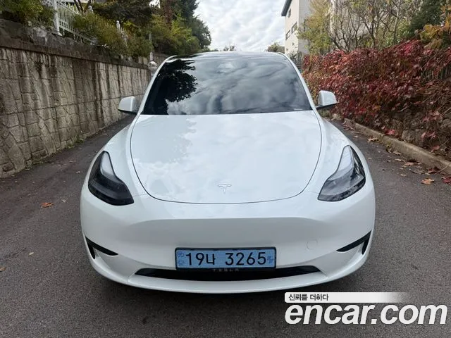 Tesla Model Y — Фото автомобиля 2
