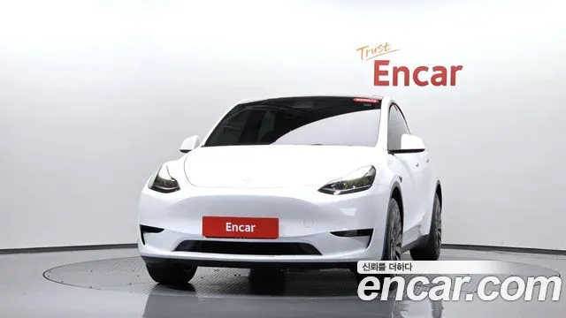Tesla Model Y — Фото автомобиля 3