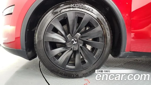 Tesla Model Y — Фото автомобиля 5