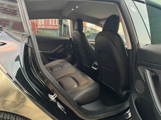 Tesla Model 3 — Фото автомобиля 8