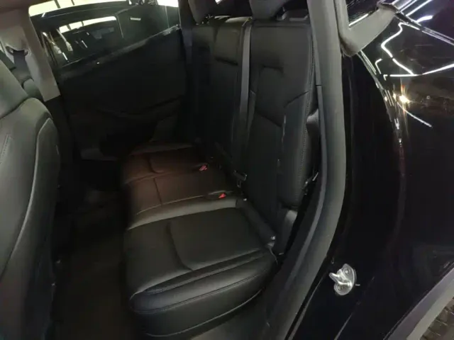 Tesla Model Y — Фото автомобиля 16
