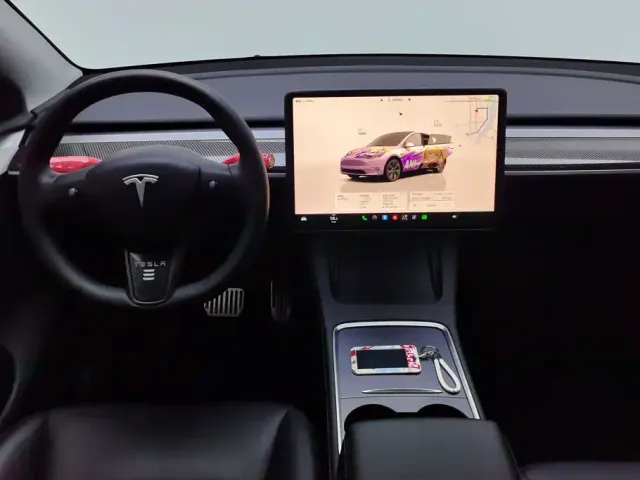 Tesla Model Y — Фото автомобиля 12