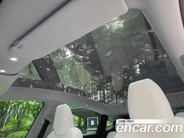 Tesla Model Y — Фото автомобиля 15