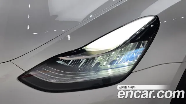 Tesla Model Y — Фото автомобиля 21