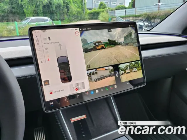 Tesla Model Y — Фото автомобиля 12