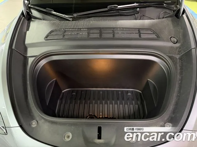Tesla Model Y — Фото автомобиля 15