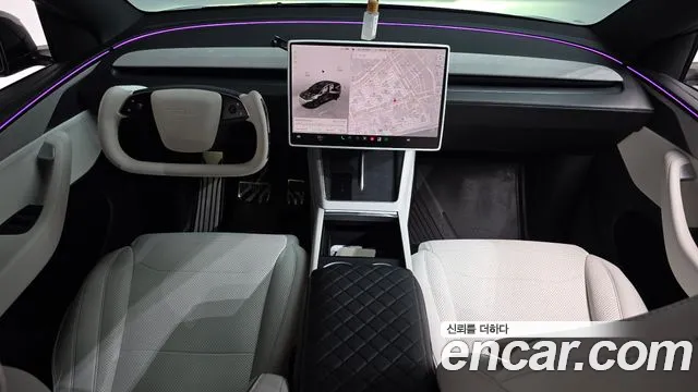 Tesla Model Y — Фото автомобиля 10