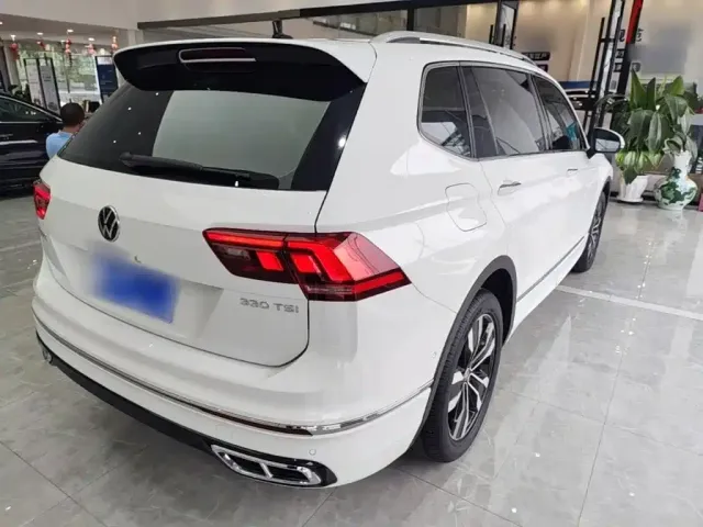 Volkswagen Tiguan L — Фото автомобиля 6
