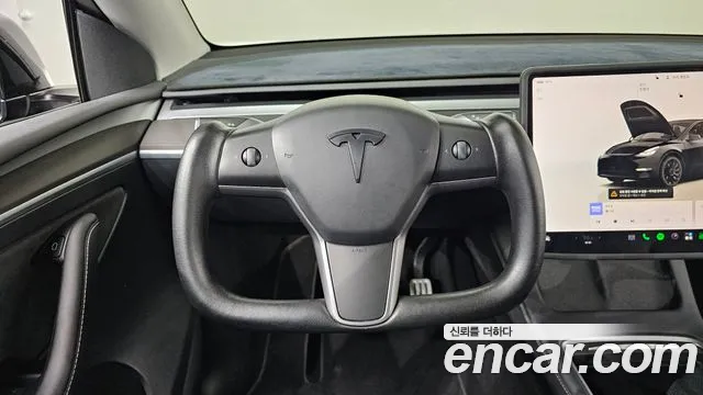 Tesla Model Y — Фото автомобиля 19
