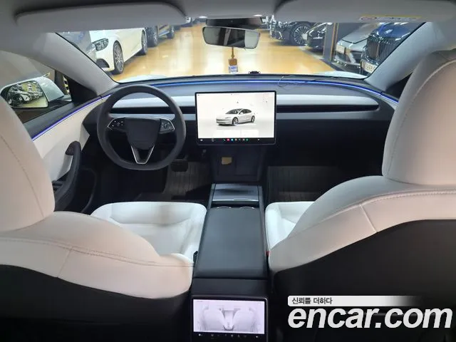 Tesla Model 3 — Фото автомобиля 7