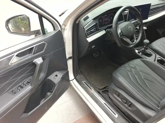 Volkswagen Tiguan L — Фото автомобиля 15