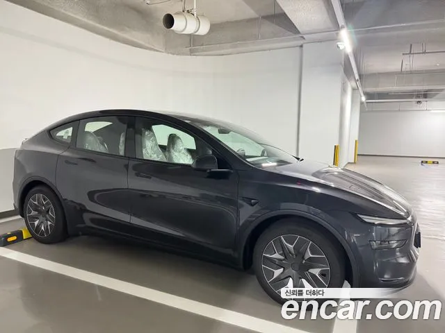 Tesla Model Y — Фото автомобиля 3