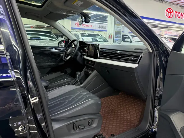 Volkswagen Tiguan L — Фото автомобиля 9
