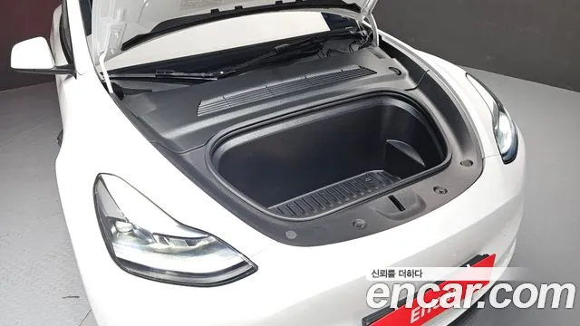 Tesla Model Y — Фото автомобиля 6
